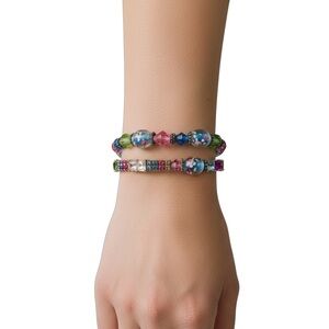 Colorful 2pc bracelet set. One stretchy rhinestone, the other beaded.